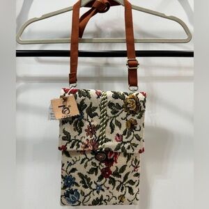 White cross-body bag with flowers
